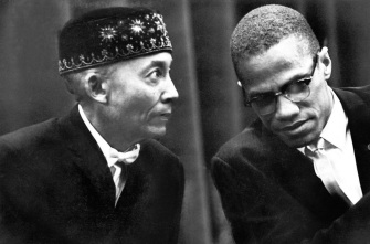 19 de Maio - Malcolm X com Elijah Muhammad.