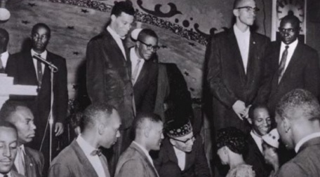 19 de Maio - Malcolm X, Elijah Muhammad e outros membros do Islã.